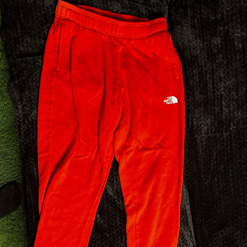 Orange north face sweats